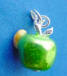 sterling silver green enamel apple charm with a yellow enamel worm