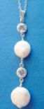 The drop in the front of the necklace has two 9mm, 2 cubuc zirconia links, and an 11mm coin pearl.