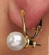 These earring converters allow you to wear pierced post earrings as non-pierced clip earrings