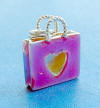 sterling silver 3-d pink enamel shopping mom bag - has heart cut-out on this side