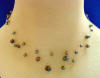 Triple-strand black pearl illsuion necklace with sterling silver clasp and extender