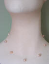 single strand pink/peach pearl illusion necklace