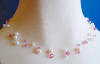 triple-strand pearl and pink crystal illusion necklace