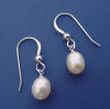 The earrings are freshwater pearl dangles on sterling silver Frenchwires