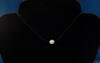 Just one oval freshwater pearl on this illusion necklace in the center of the neck