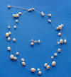triple-strand pearl illusion necklace and pearl stud earrings jewelry set