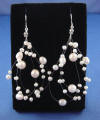 approx. 3 inches long floating triple-strand pearl earrings for your wedding
