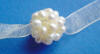 beautiful pearl ball on ivory organza