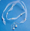 white organza and white pearl necklace and earrings
