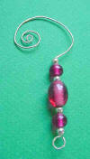 sterling silver cranberry glass ornament hanger was retired in 2005