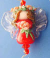 a beautiful handcrafted angel lampwork bead is the 2003 limited edition ornament hanger