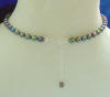 The back of the necklace has a sterling silver 2" extender.