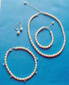 bridal jewelry set - pearl necklace, pearl bracelet, pearl leverback earrings, and a something blue pearl anklet