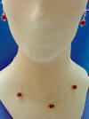sterling silver necklace and earrings jewelry set made with handmade red rose lampwork beads