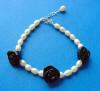 handcrafted freshwater pearl and handcarved black onyx roses bracelet with sterling silver clasp and 1" extender