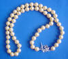 opera length golden shell pearl necklace