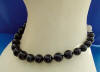 This black shell pearl necklace goes from 12mm to 16mm in shell pearl sizes