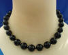 Graduated black shell pearl necklace