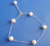 round white pearl station bracelet with pearls ON the chain