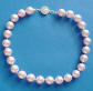 handcrafted Swarovski(TM) crystal pearl necklace with sterling silver filigree clasp