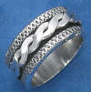 sterling silver 1mm wide woven rope design spinner with textured criss-cross design edges wedding band
