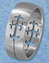 stainless steel wedding band with cut-out crosses
