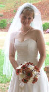 This bride is wearing a traditional strand of pearls for her wedding day.